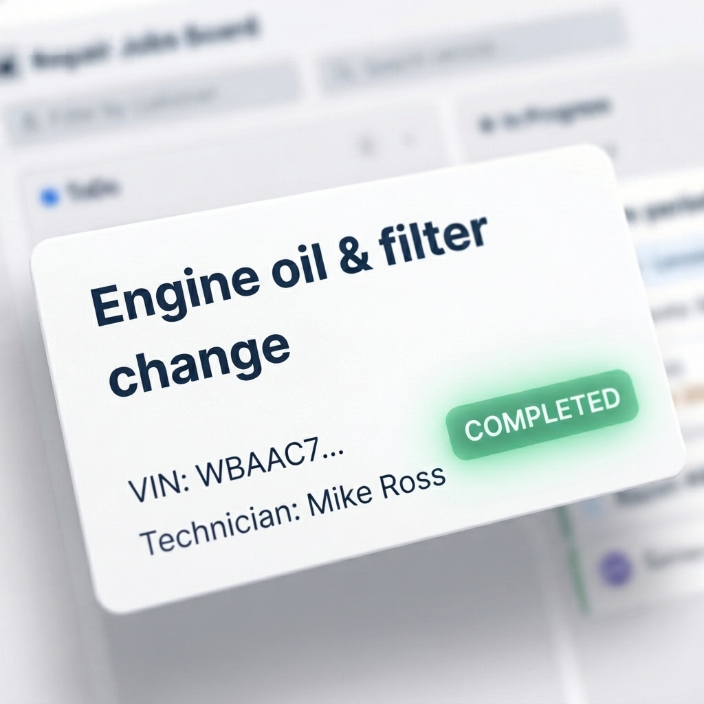 A completed job card on the repair board — engine oil and filter change, VIN and technician, marked Completed